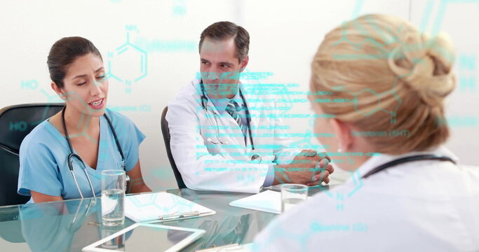 Image of data processing over diverse doctors talking at meeting