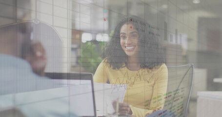 Image of financial data processing over diverse business people in office