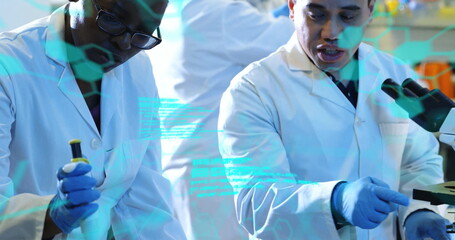 Image of scientific data processing over diverse scientists in laboratory