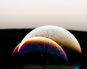 Space abstraction: bright color overflows in the style of soap bubbles. The play of light and textures creates the effect of a planet in the universe. Ideal for concepts of art and futurism.