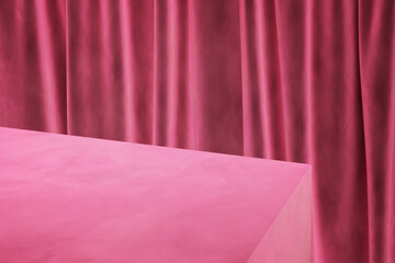 Valentine's day background with pink velvet backdrop and pastel table corner.