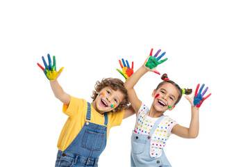 Two joyful children in overalls, faces and hands smeared with colorful paint, enthusiastically showing their hands in a fun and creative moment. Isolated on a transparent background