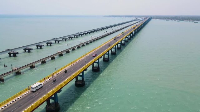 Aerial drone shot showcasing Rameshwaram city&rsquo;s charm, with the bridge standing prominently in the distance.
