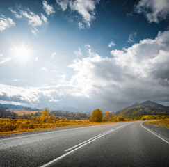 country road in autumn mountain landscape