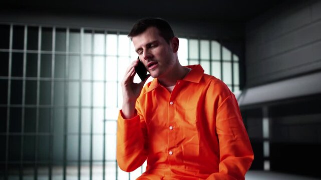 Prisoner Behind Bars In Jail Cell. Crime Punishment