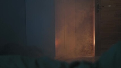 Fire in the apartment. Fire in an apartment with a smoky room. First-person shooting. Apartment building occupant fire safety