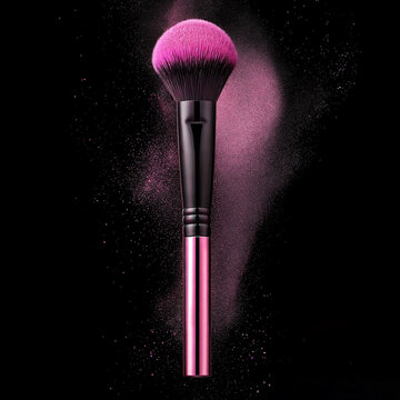 A brush for dynamic makeup application with pink powder on a black background