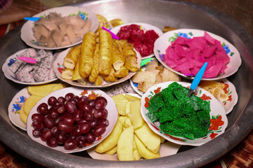 A variety of Myanmar snacks, desserts, and fruits, delicious Myanmar food.