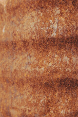 Corroded metal background. Rustic, weathered metal plate with orange and brown corrosion.
