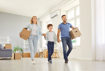 Happy family, cheerful owners moving new flat, enter home, excited parents, child, tenants holding...