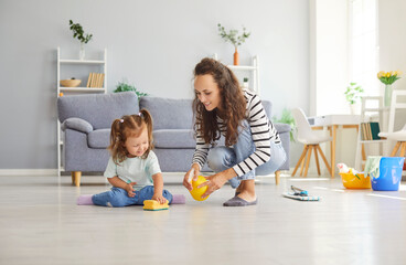 Happy educational pastime, developing creativity skill in kid, mother and her small daughter on...