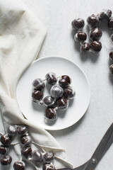 Overhead view of nigerian baba dudu candy, top view of Ghana coconut candy or kube toffee candy, hard candy made with coconut milk and sugar