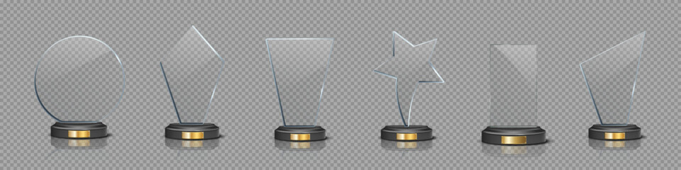 Naklejka premium Glass award trophy set. Crystal winner prizes on transparent background. Acrylic winner cups. Realistic vector illustration set of trophy for sport competition, business achievement, recognition.