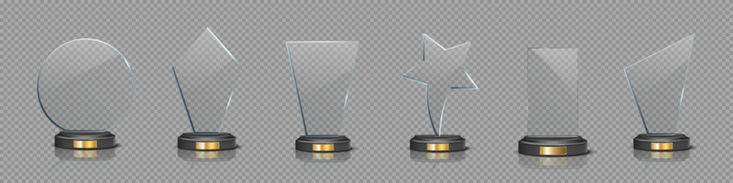 Glass award trophy set. Crystal winner prizes on transparent background. Acrylic winner cups. Realistic vector illustration set of trophy for sport competition, business achievement, recognition.