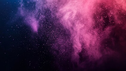 Abstract pink and blue powder explosion on black background. (2)