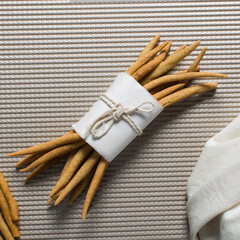 Top view of fried corn stick snack on a baking sheet, Overhead view of nigerian kokoro corn snack	