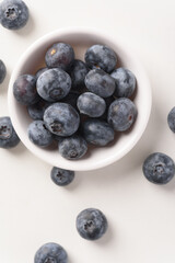Close up of fresh blueberries for healthy food on white background.