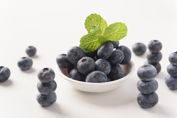 Close up of fresh blueberries for healthy food on white background.