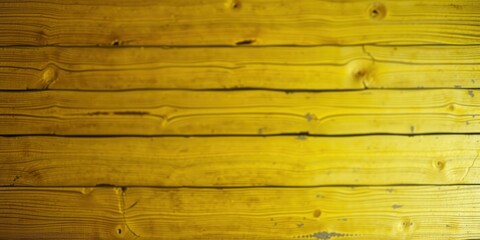 Fototapeta premium A close-up of a wooden surface, the planks are arranged horizontally and painted a vibrant yellow, with the grain and texture of the wood visible through the paint