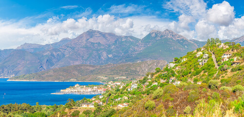 Fototapeta premium Landscape with Saint Florent village, small town on the coast of northern Corsica island, France.