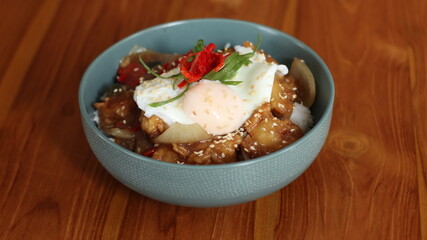 ricebowl with chicken teriyaki and pouch egg