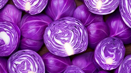 Obraz premium A close-up of vibrant purple cabbages arranged on a surface.