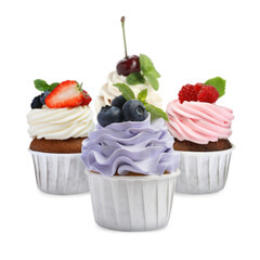 Delicious cupcakes with berries isolated on white