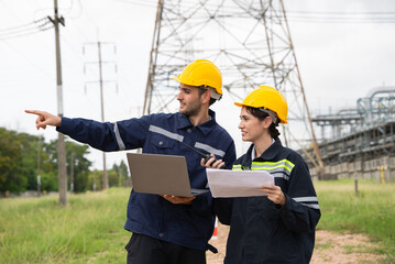 Engineer worker checking project at petrochemical factory or refinery oil plant industrial. Survey...