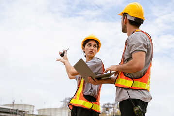Engineer worker checking project at petrochemical factory or refinery oil plant industrial. Survey and inspecting for safety and quality of the production