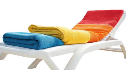 A colorful set of towels neatly arranged on a sun lounger, inviting relaxation and leisure by the poolside or beach. Perfect for summer vibes.