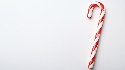Classic red-and-white striped Christmas candy cane on a plain white background