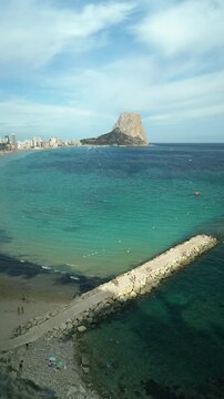 Aerial view of Calpe&rsquo;s coastline with Ifach rock and turquoise sea