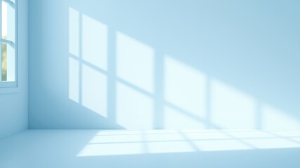 Fototapeta premium Sunlight streams through a window casting a soft, checkered pattern on the pale blue wall and floor of an empty room.