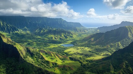 Lush Green Valley with Mountains and Blue Sky a Stunning Aerial View