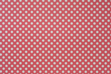 red paper with polka dots