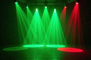 Laser light show. Bright led laser beams, dj light party. Green illuminated stage, red led strobe lights. Background, backdrop for displaying products