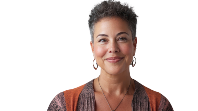 A portrait of a joyful woman with short gray hair and a warm smile, dressed in a stylish outfit. Her expression radiates confidence and positivity.