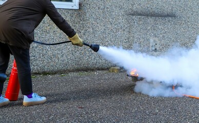 fire prevention. corporate safety - exercise during a firefighting course