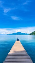 Fototapeta premium Serene view from a wooden pier by the sea.