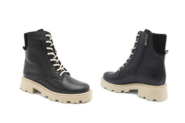 Fashionable leather lace-up boots with heels isolated on white background. View from all sides.