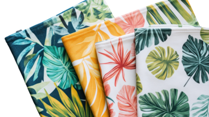 Colorful fabric sheets featuring vibrant tropical leaf patterns, perfect for home decor, crafting projects, or fashion design inspirations.