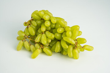 Fresh green grape cluster isolated on white background.