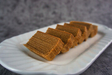 Lapis legit or spekuk (Dutch: Spekkoek) is a type of traditional wet cake from Indonesia.