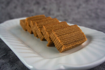 Lapis legit or spekuk (Dutch: Spekkoek) is a type of traditional wet cake from Indonesia.