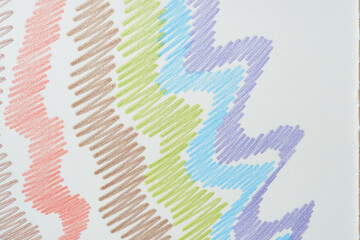 rough wavy lines composed of many strokes in red, brown, green, blue, and purple on paper