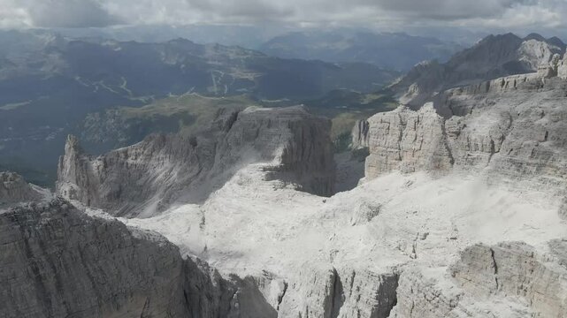 Drone footage of Sentiero Alfredo Benini near Castelletto Superiore and Bocca di Tuckett in the Brenta Dolomites, highlighting rugged limestone cliffs, exposed ridges, and breathtaking alpine scenery 