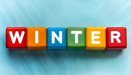 Obraz premium 冬を意味する英単語WINTTERの文字が書かれた木製のキューブブロック。 aiで生成
