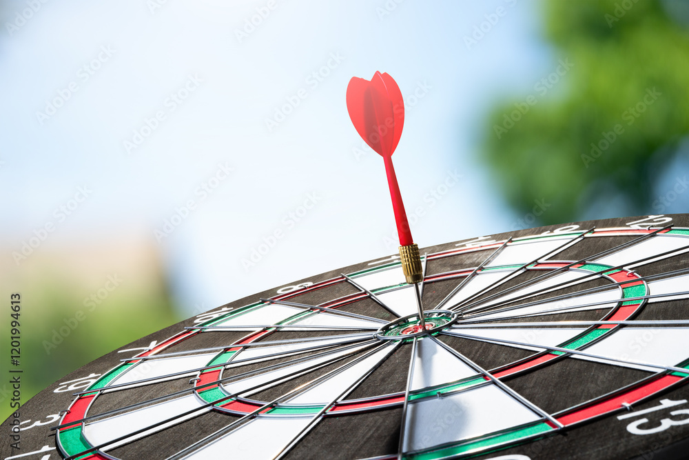 Aufkleber dart on target with blur background
