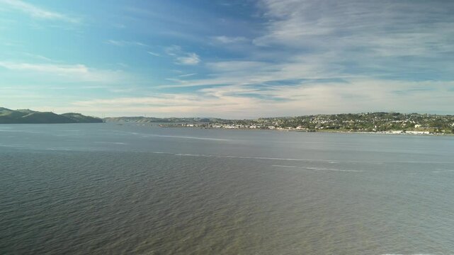 The aerial drone views showcasing the rolling hills of Port Costa and the scenic cityscape of Benicia, California, with sweeping landscapes and waterfront vistas