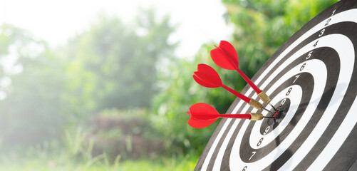 Business background with arrow on target